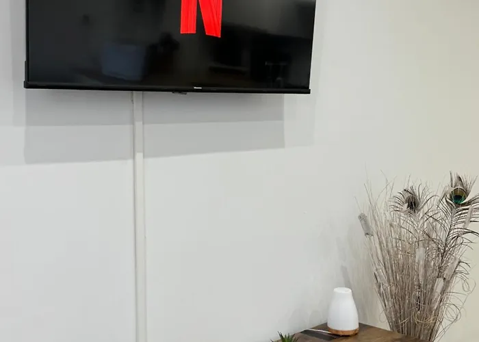 Em *