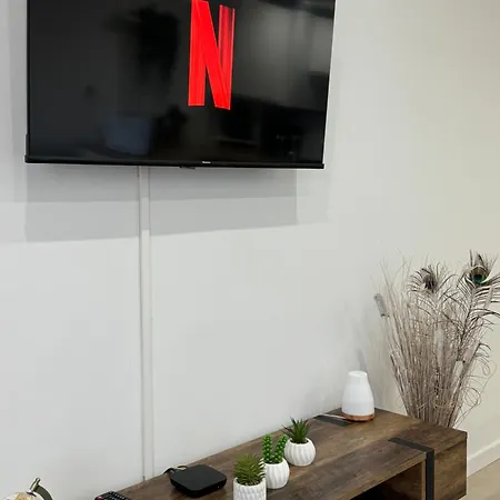 Em *